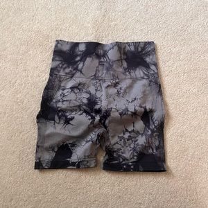 Tie-dye grey gym shorts.